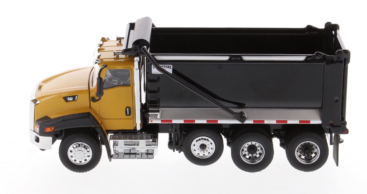 CAT CT660 SBFA mit OX Stampede Muldenkipper Modell von DieCast Masters 1:50