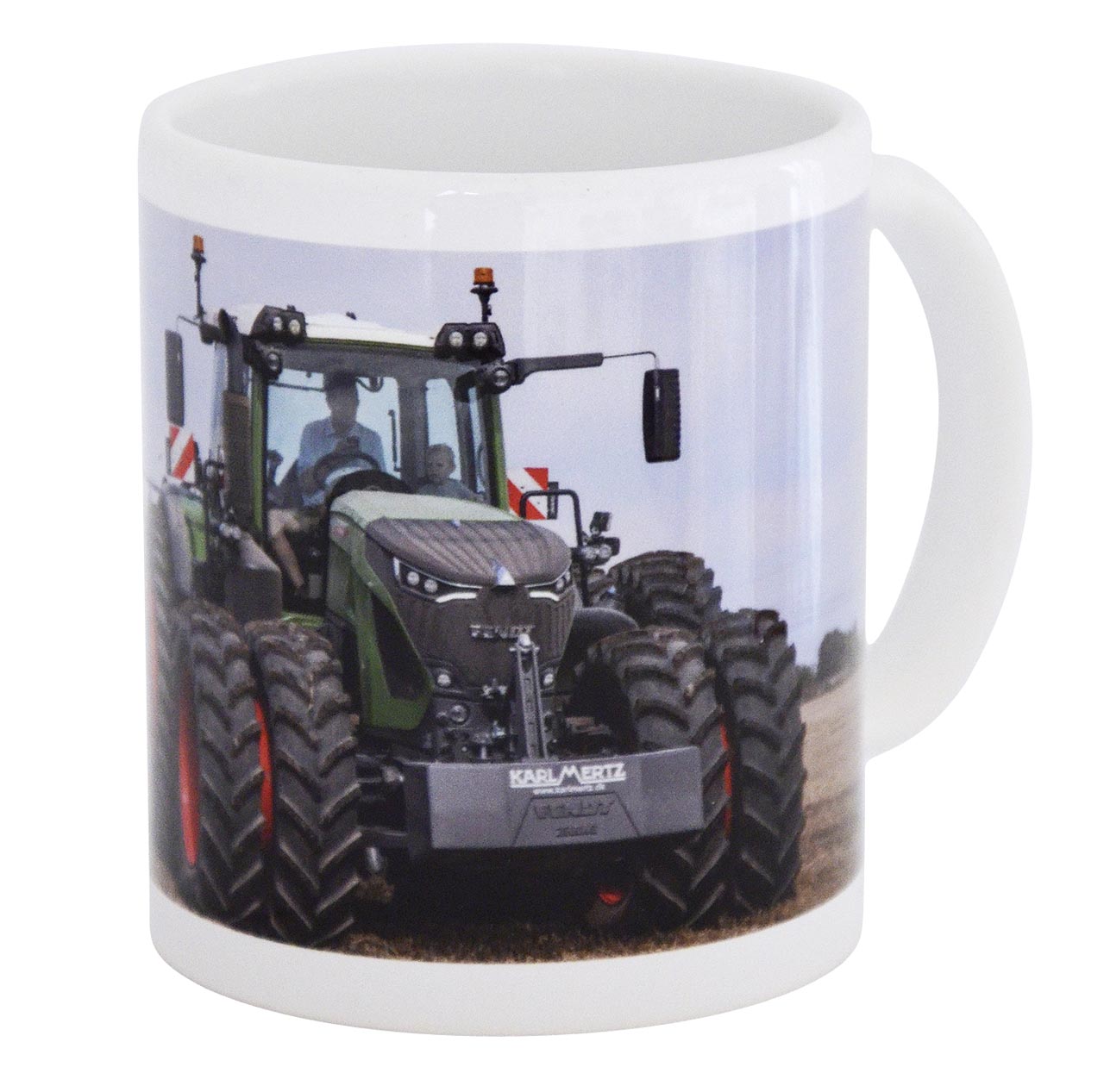 Becher Fendt 942 mit Zwillingsbereifung und Köckerling Grubber
