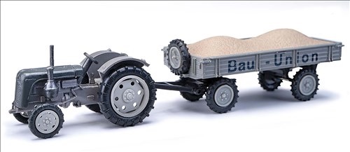 Traktor Famulus Bau Union mit Anhänger und Kiesladung Modell von Busch 1:87