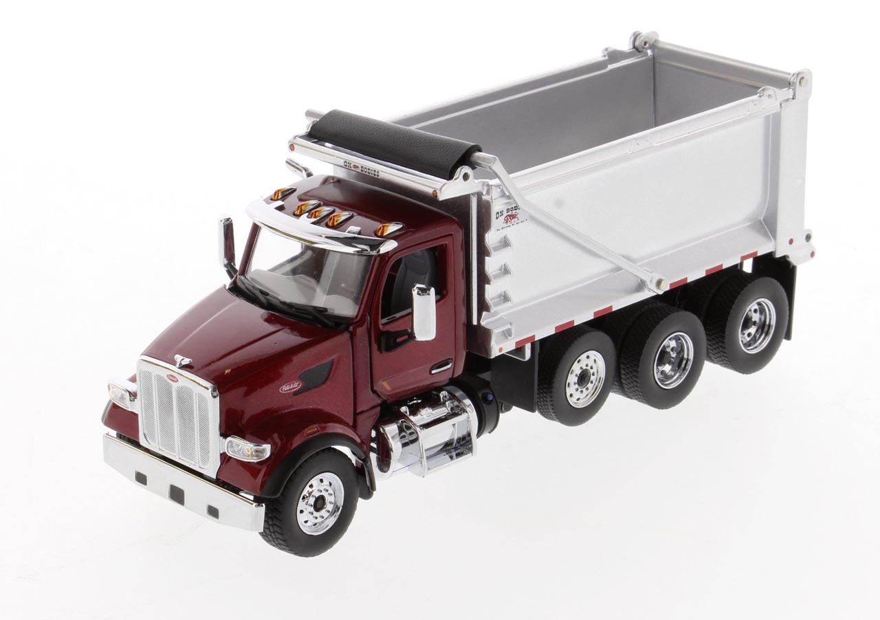 Peterbilt 567 SF Ox Stampede Muldenkipper rot metallic Modell von DieCast Masters 1:50