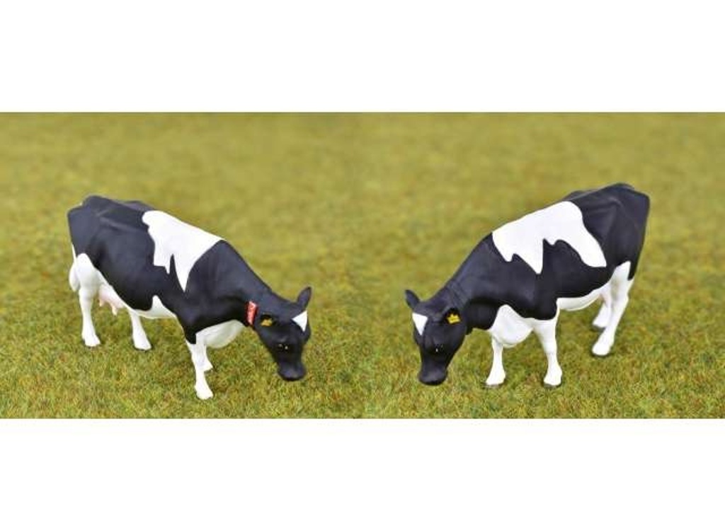 Holstein-Rinder, 4 Friesische Rinder mit Ohrlabel und Transponder  Modell von AT Collections 1:32