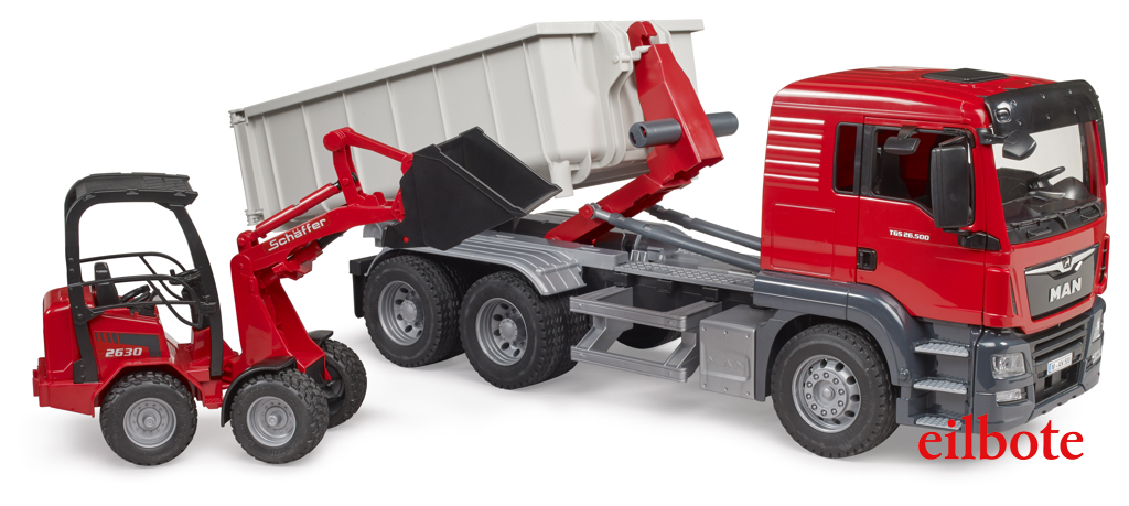 MAN TGS Lkw mit Abrollcontainer und Schäffer Hoflader 2630