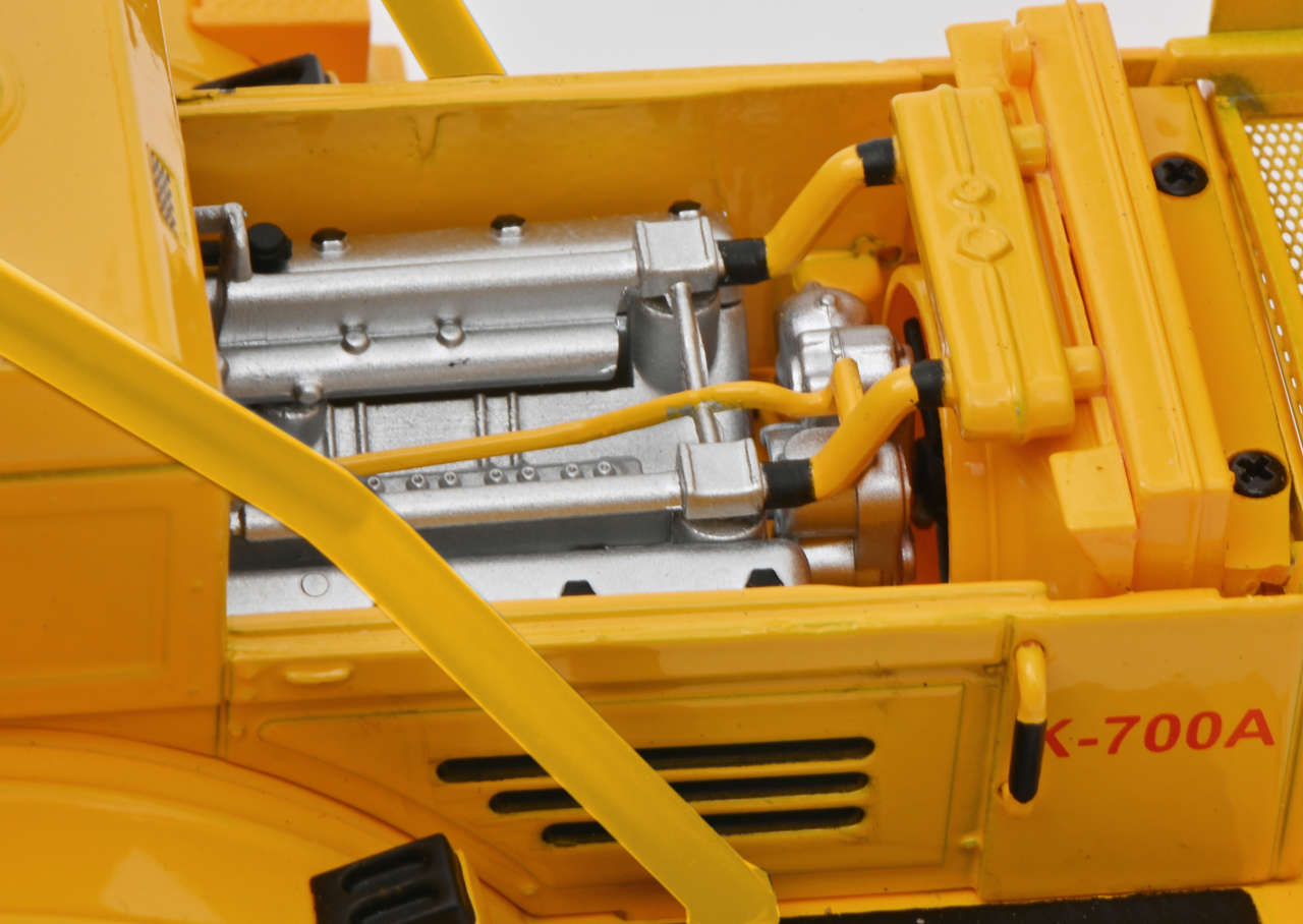 Kirovets K700 A mit 3 Figuren Modell von Schuco 1:32