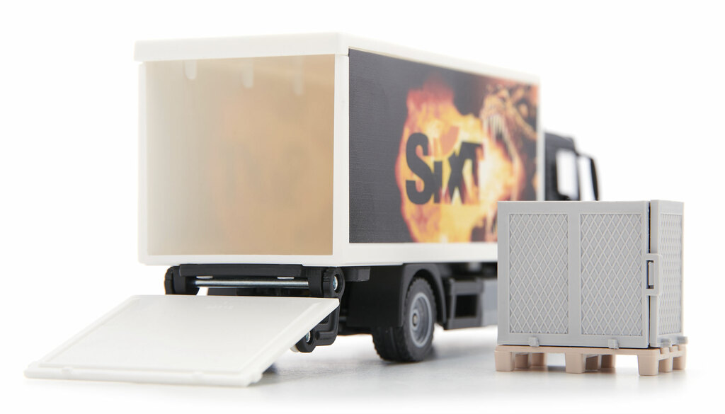 MAN SIXT Lkw mit Kofferaufbau und Ladebordwand, Palette und Gitterbox Modell von Siku 1:50