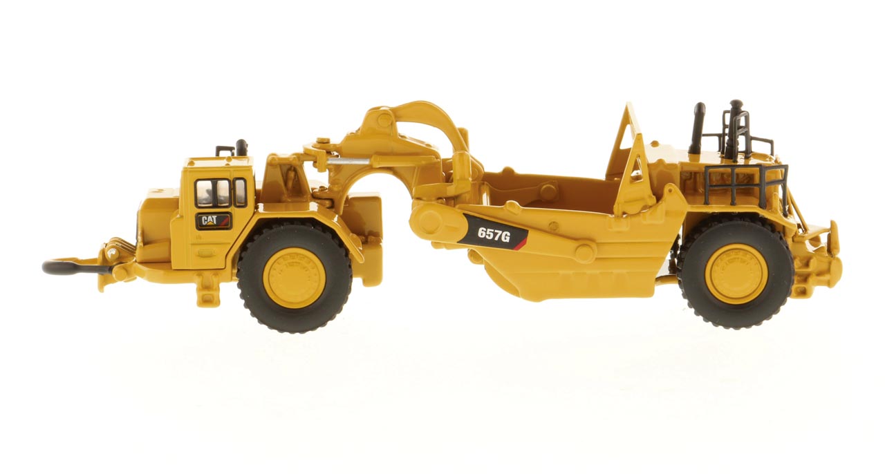 Cat 657G Schürfzug - in High Line Blechdose verpackt Modell von DieCast Masters 1:125